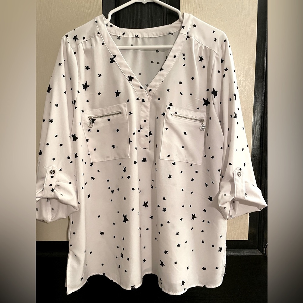 Beautiful new blouse without tags. Size is XL. Not sure of Brand name.